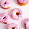 Pink tile marble double-sided vinyl photography backdrop photographed with pink icing donuts - backdrop collective australia