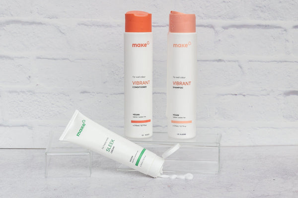 Make shampoo and conditioner photographed on white brick concrete double-sided vinyl photography backdrop - backdrop collective australia
