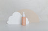 brushed white concrete textured waterproof vinyl photography backdrops for product photography with acrylic cloud and beige circle props - backdrop collective