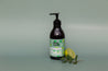 dark Sage green double-sided vinyl waterproof photography backdrop photographed with. mint and lime hand soap - backdrop collective melbourne