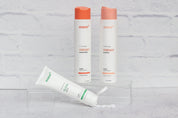 Make shampoo and conditioner photographed on white brick concrete double-sided vinyl photography backdrop - backdrop collective australia