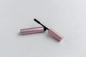 mascara photographed on concrete textured vinyl photography backdrop - backdrop collective Australia