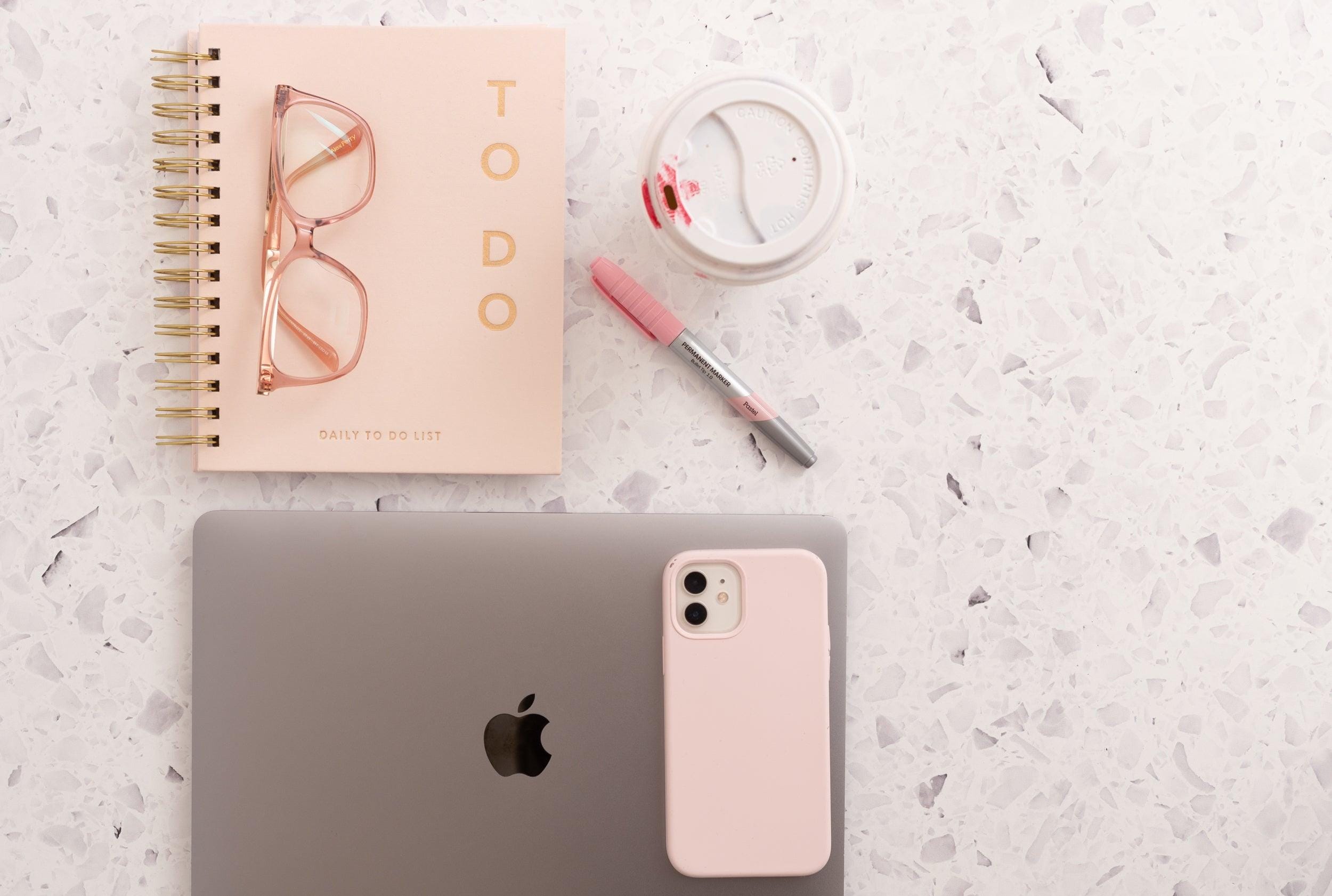 terrazzo textured Photography vinyl backdrop with tech accessories and coffee - Backdrop Collective Melbourne