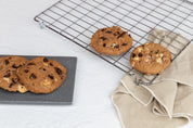 white concrete  textured waterproof vinyl photography backdrops with cookies and cooking accessories - backdrop collective