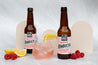 Industrial concrete double-sided backdrops with beige arches photographed with organic kombucha and fruit - Backdrop Collective