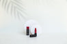 white circle acrylic props with Morphe red lipstick white palm tree shadow backdrop and white concrete vinyl photography backdrop - backdrop collective Melbourne
