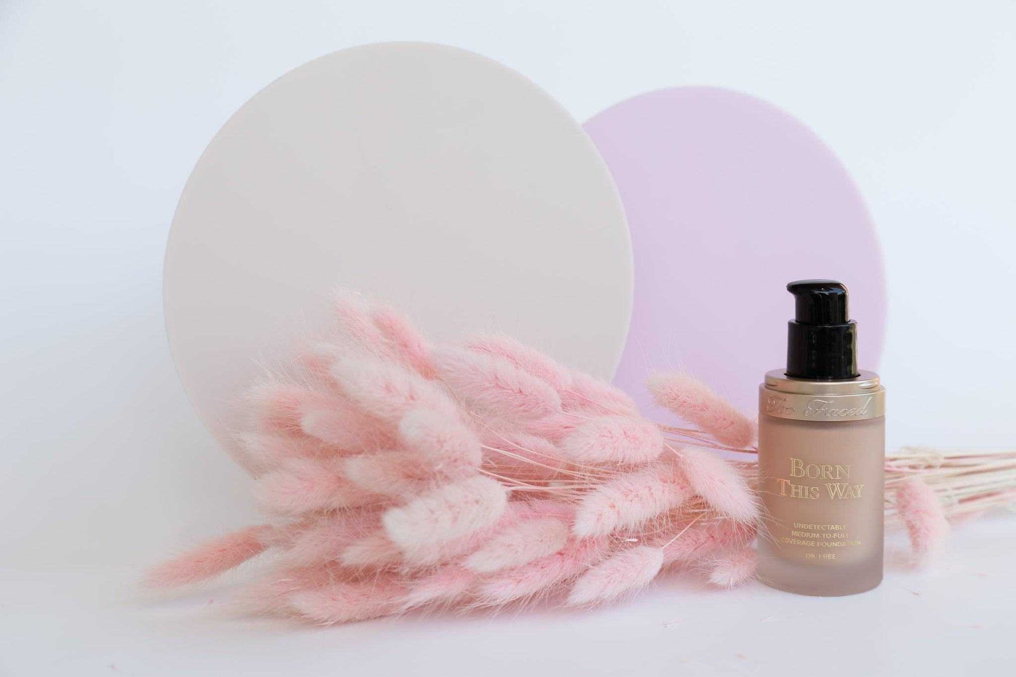 two beige and pink Medium Acrylic Circle props - Backdrop Collective