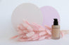 two beige and pink Medium Acrylic Circle props - Backdrop Collective