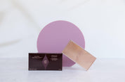 purple wild plum Medium Acrylic Circle with shadow backdrop photographed with charlotte tilbury bronzer- Backdrop Collective
