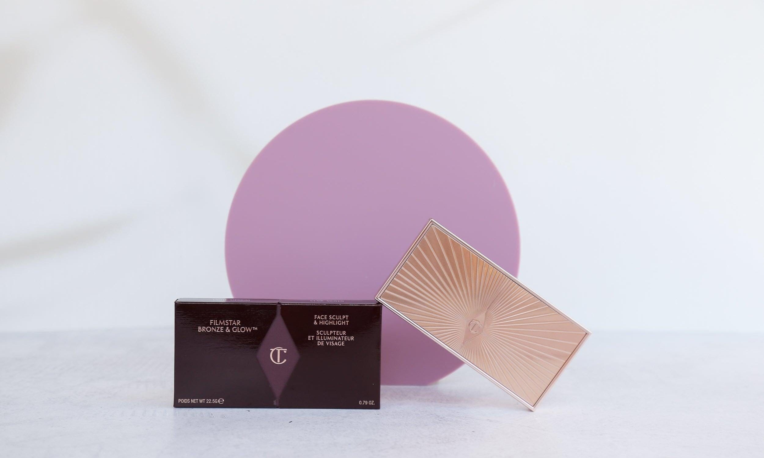 purple wild plum Medium Acrylic Circle with shadow backdrop photographed with charlotte tilbury bronzer- Backdrop Collective