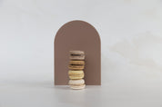 Large Acrylic coffee brown Arch with macaroons on marble vinyl backdrop- Backdrop Collective melbourne
