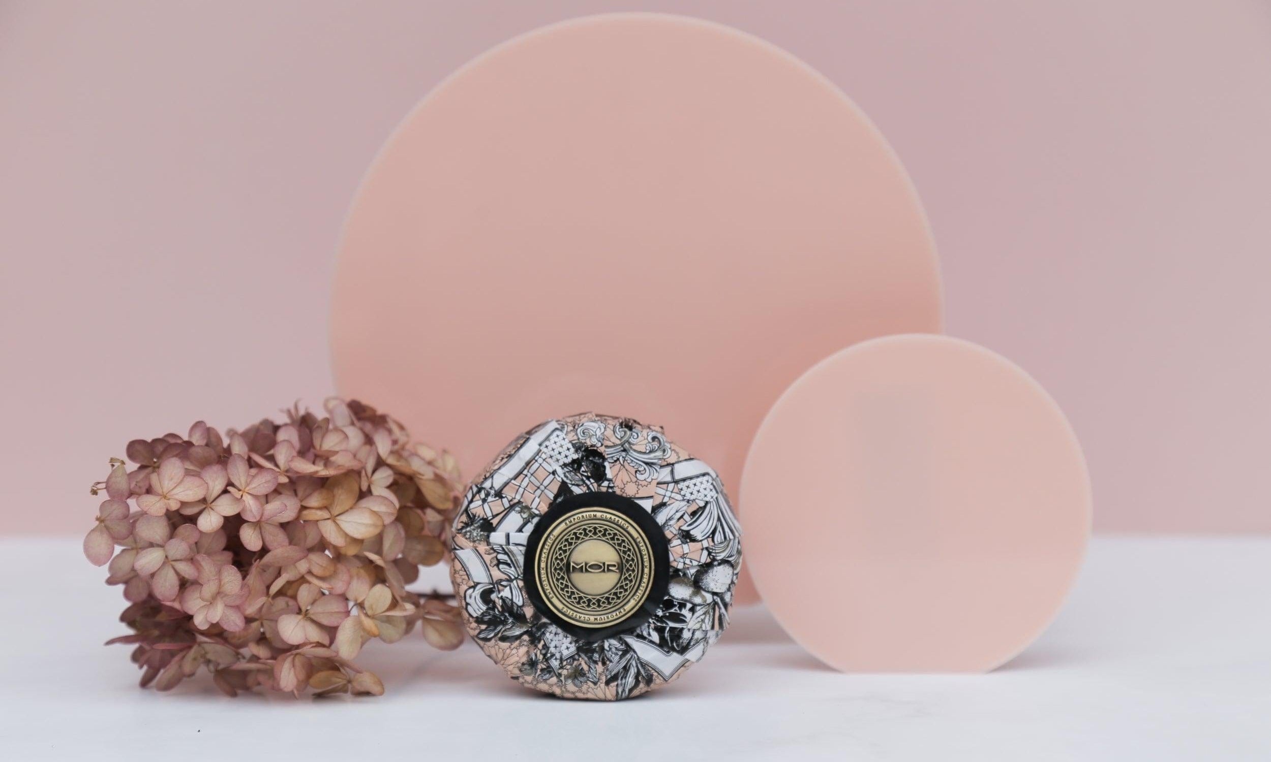 peach acrylic round props with pink vinyl photography backdrop for product photography with dried flowers - Backdrop Collective Melbourne