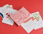bright red photography backdrop with cards - backdrop collective melbourne
