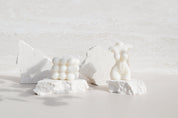 textured vinyl photography backdrops with natural stone pieces for candle product photography - Backdrop Collective Melbourne 