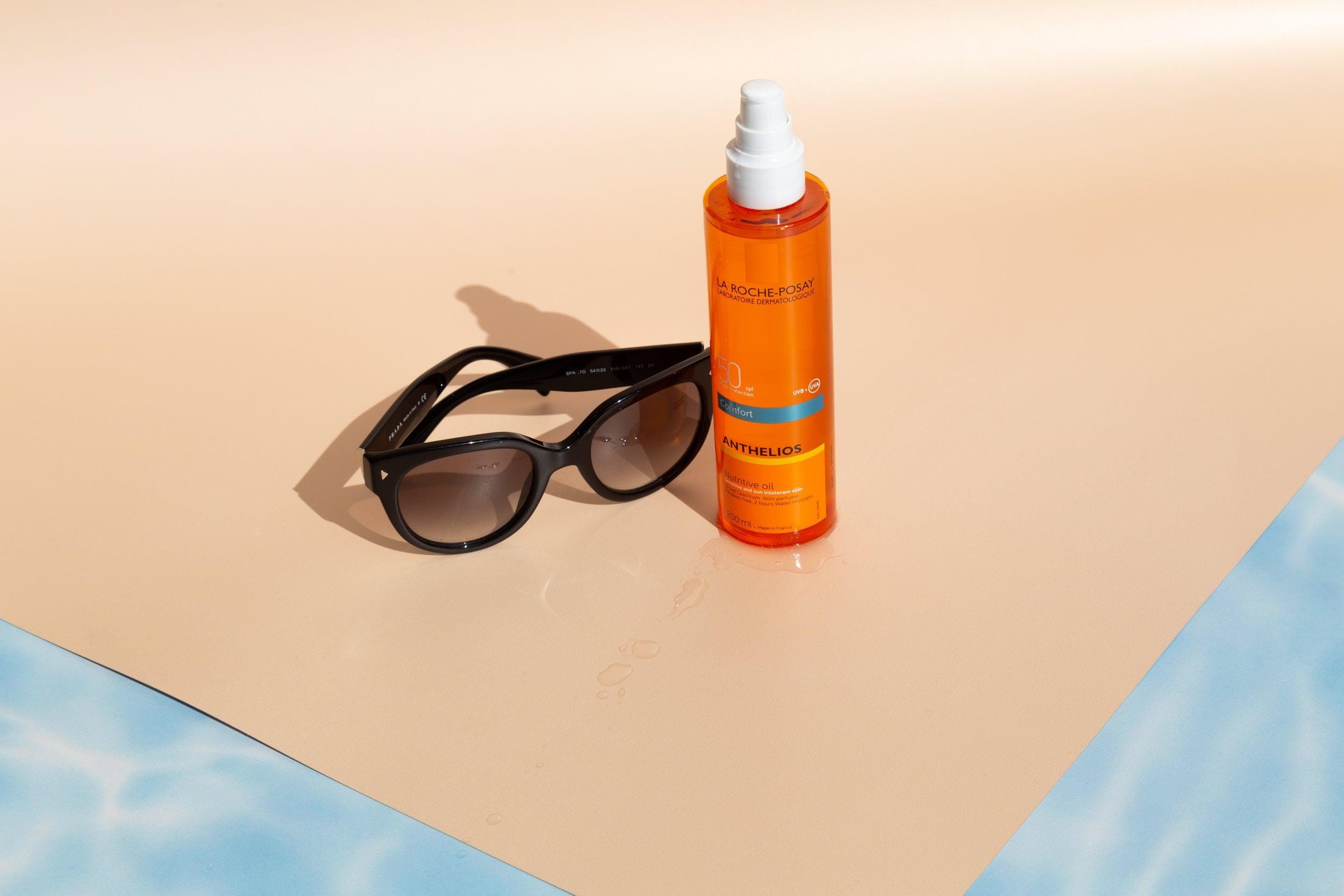 caramel and water effect vinyl backdrops beach scene with sunglasses - Backdrop Collective
