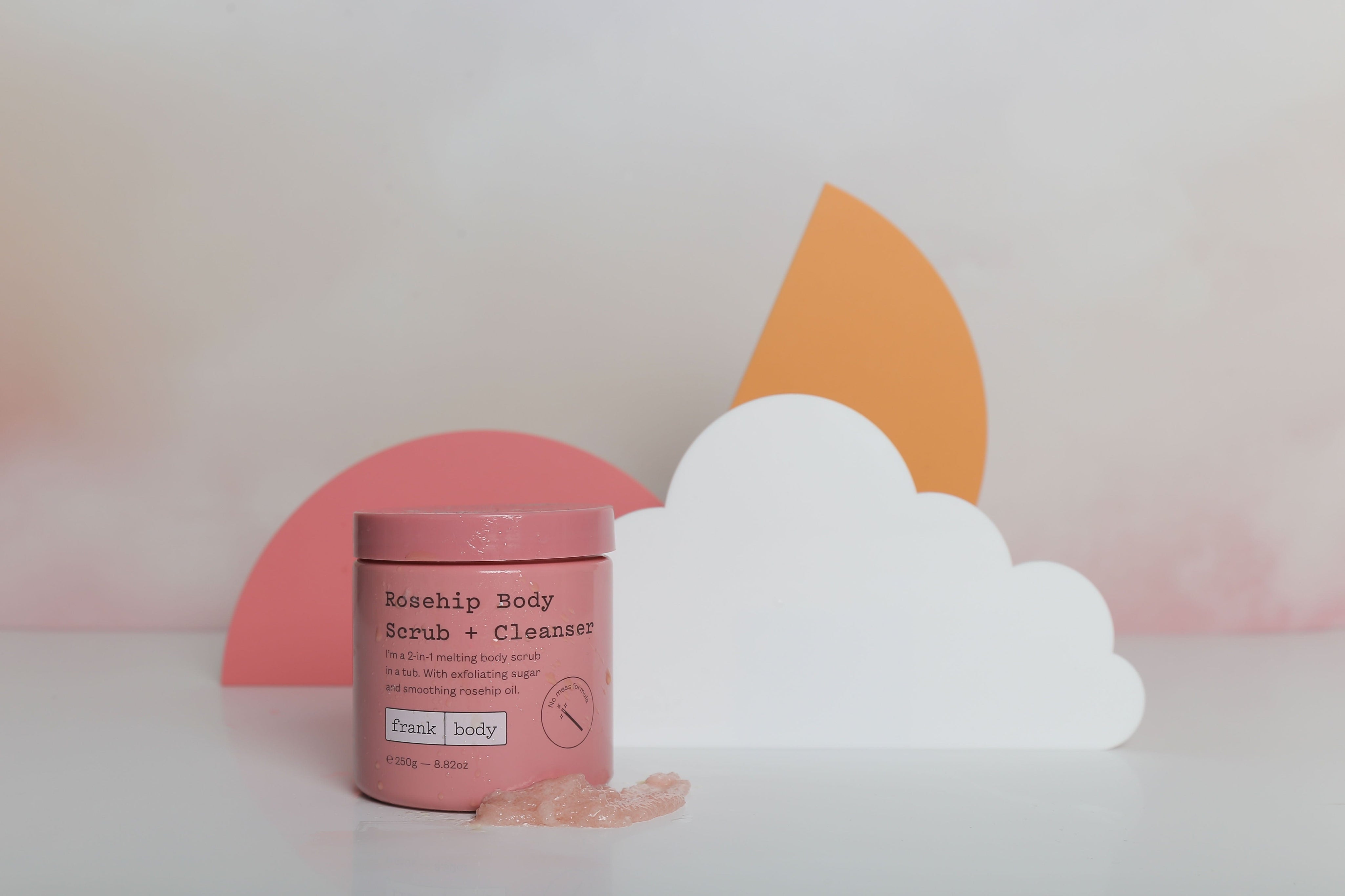 White Cloud orange and pink semi circle Acrylic Prop Backdrop Collective Melbourne with Frank Body Skincare products