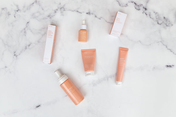 go-to skincare products photographed on granite marble double-sided vinyl photography backdrop - backdrop collective australia