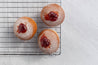 grey concrete textured waterproof vinyl food photography backdrops with jam donuts and rack - backdrop collective melbourne