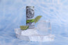 Water effect blue vinyl backdrop with white limestone natural stone prop photographed with White claw seltzer and lime - backdrop collective melbourne australia 